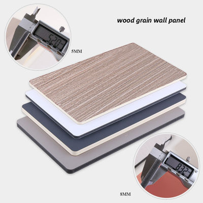 Panneaux muraux décoratifs de panneau mural en PVC du grain de bois plat imperméable et anti-moisissure 1220mm